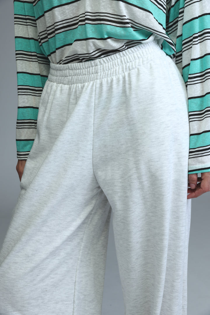 Light grey joggers with elastic waistband shown from the front in a heathered sweatpants style