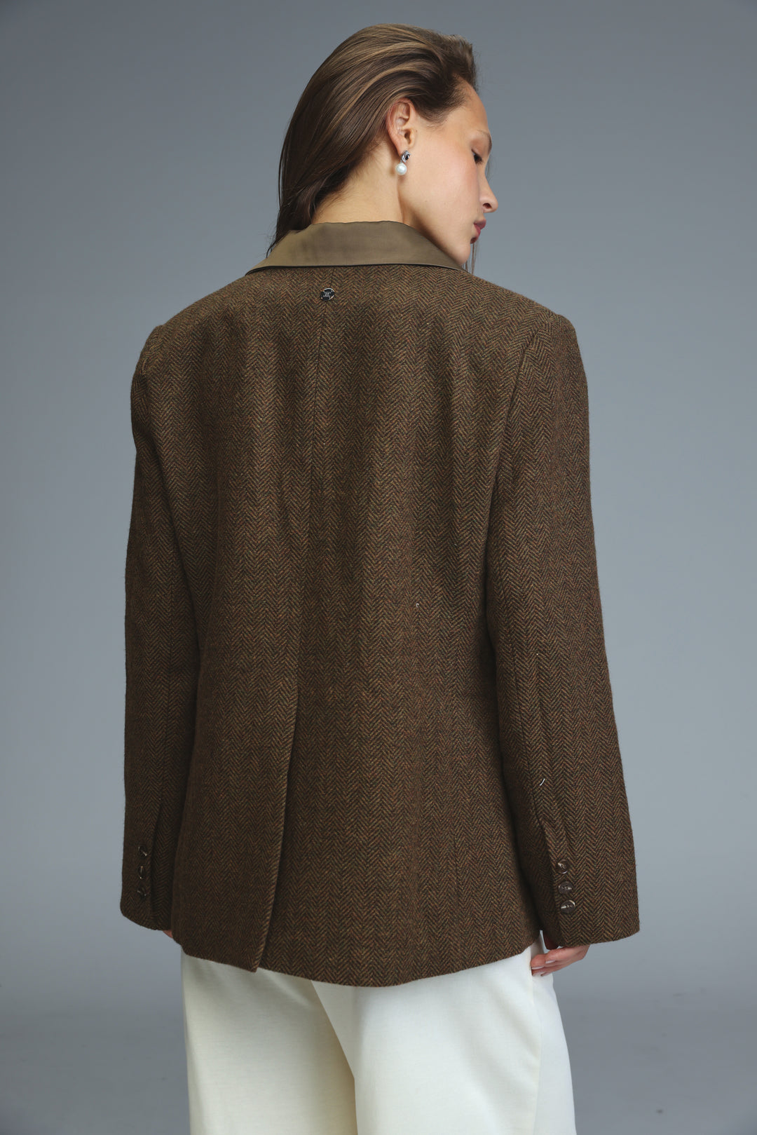 Penthouse brown herringbone blazer with contrasting olive green collar shown from the front