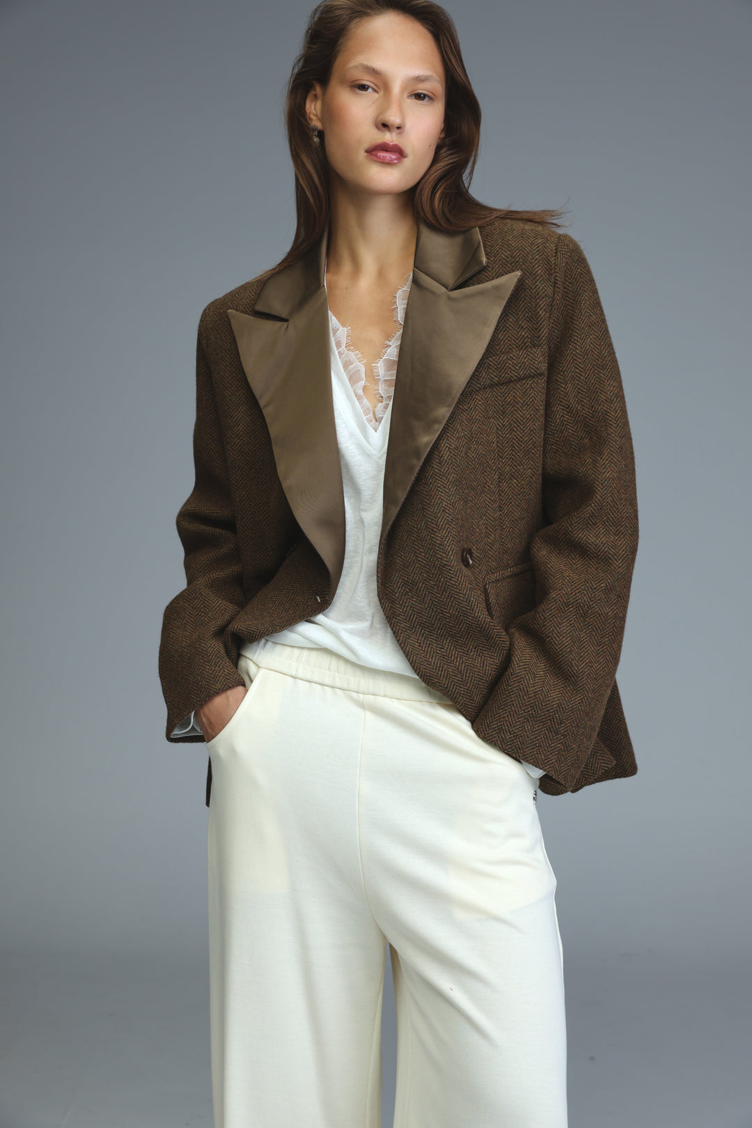 Penthouse brown blazer with herringbone pattern and contrasting satin lapels shown from the front