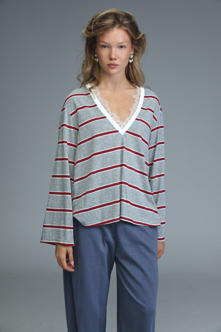 Glow grey striped shirt with gray and red horizontal stripes and white lace-trimmed v-neckline front view