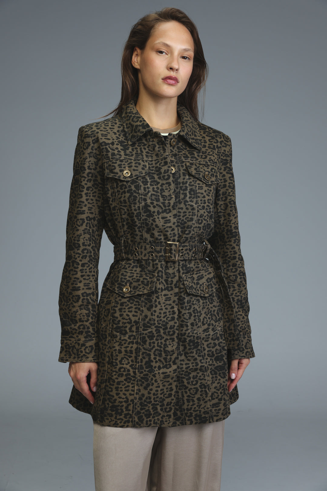 Dark green and black leopard-print trench coat with belted waist buttoned front and flap pockets shown from the front