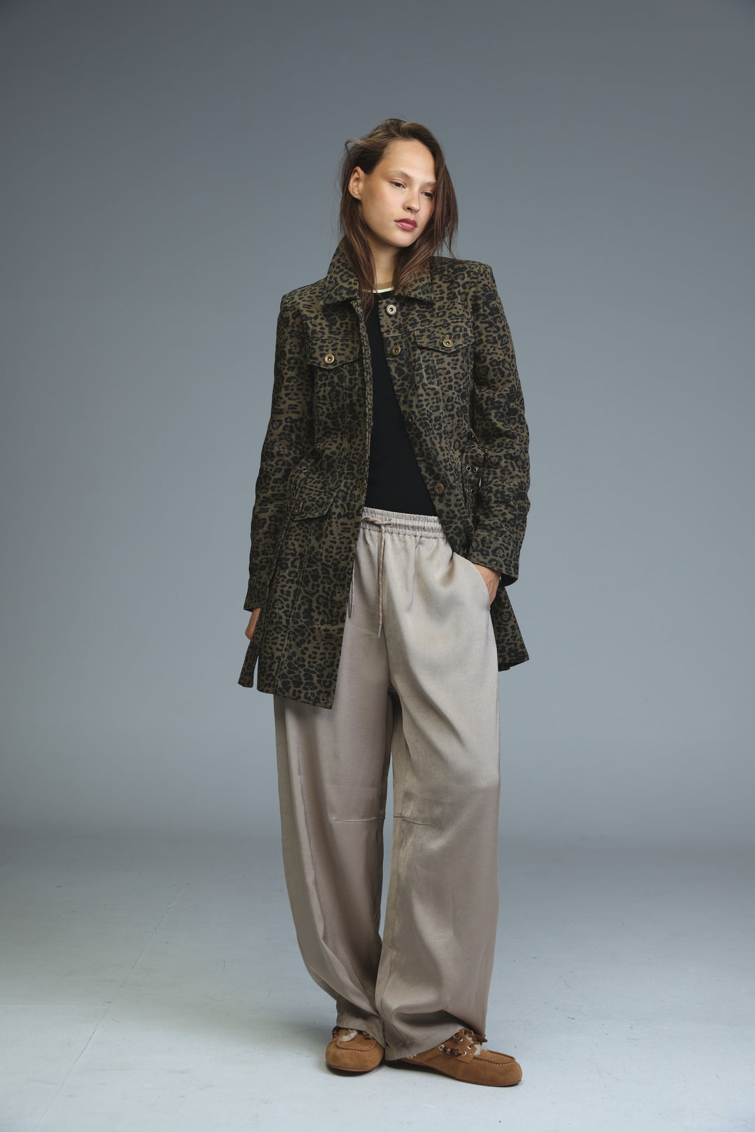 Opulence leopard jacket in dark green and black with classic collar, button closures, and front flap pockets