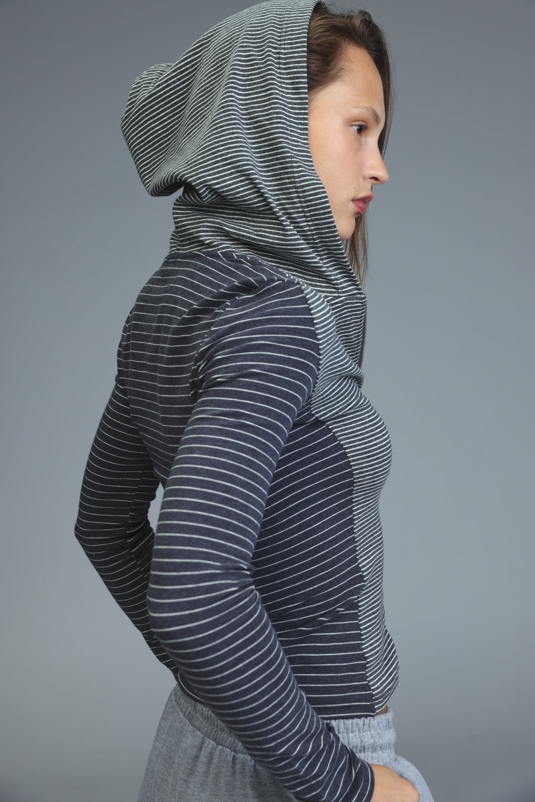 Zip up brown stripes hoodie with dark gray and white stripes and a fitted athletic cut front view