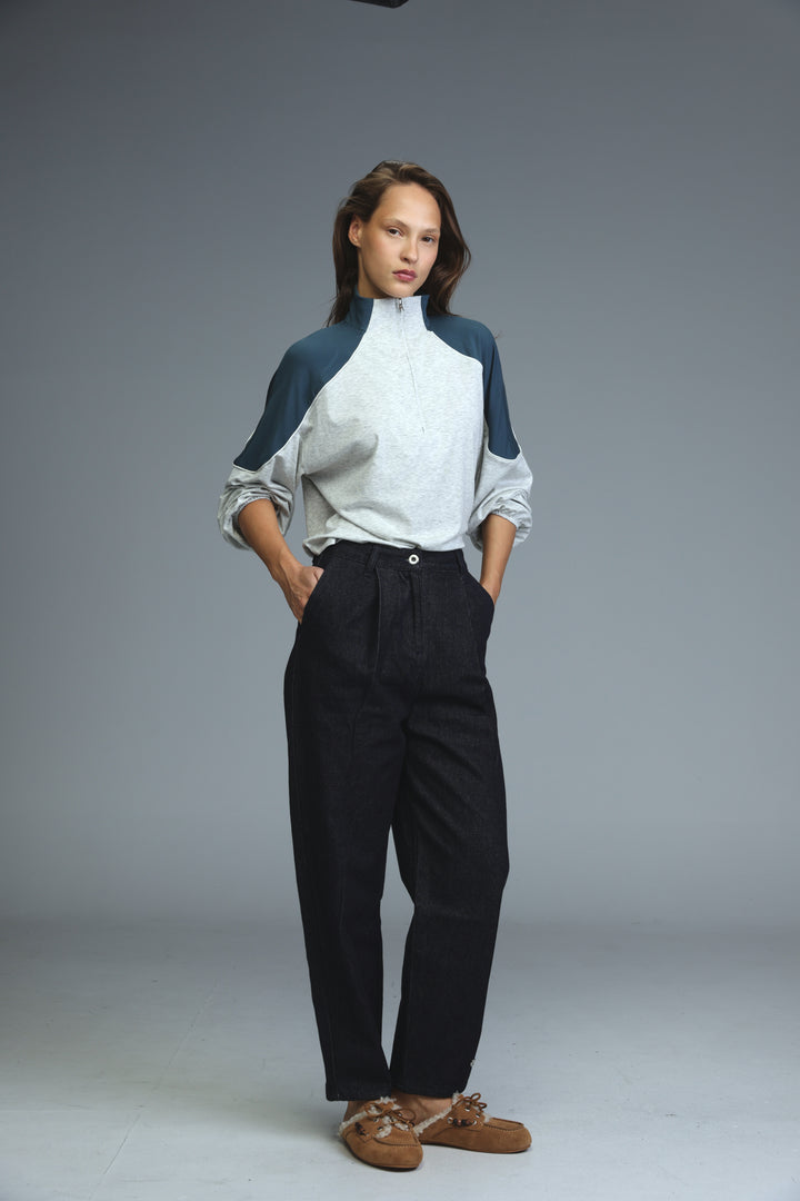 A front view of a star 250 dark blue tailored denim two-tone zip-up top with navy sleeves and light gray body