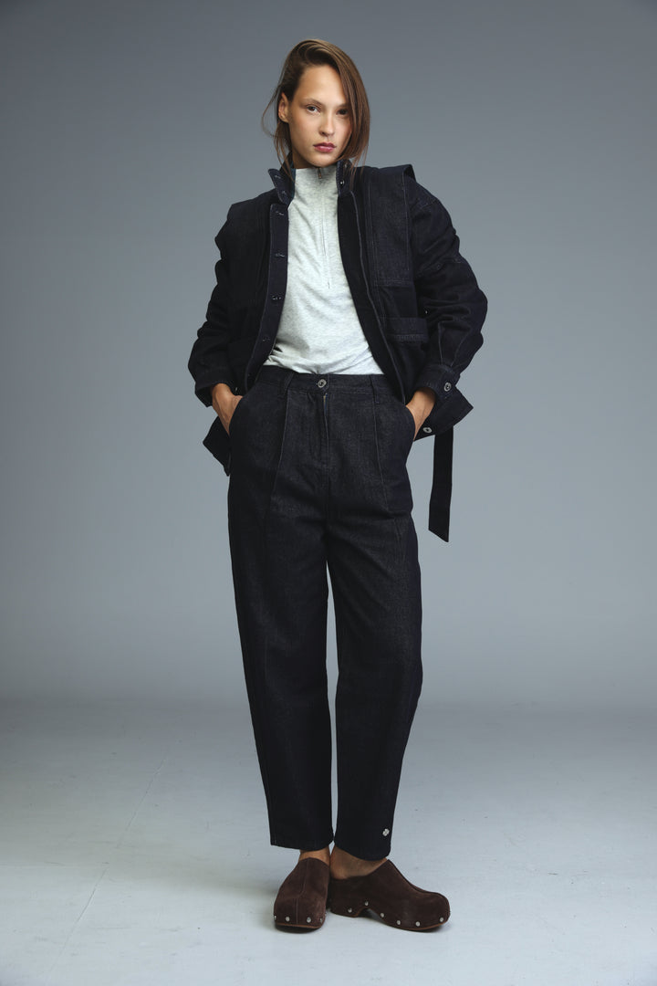 Prestige dark blue denim jacket with structured slightly oversized silhouette and visible stitching details front view