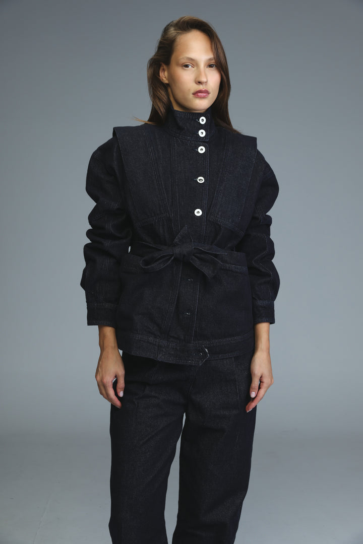 Prestige dark blue denim jacket with puffed sleeves and belted waist shown from the front