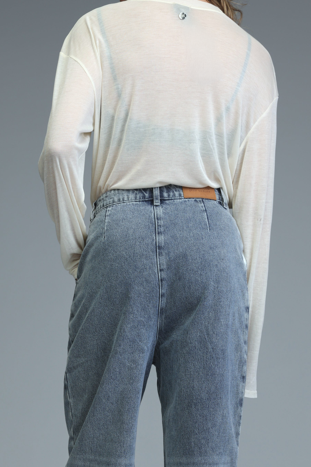 Hello Coffee Cream Shirt is a translucent white long-sleeved top with a subtle gradient and a metallic button at the neckline