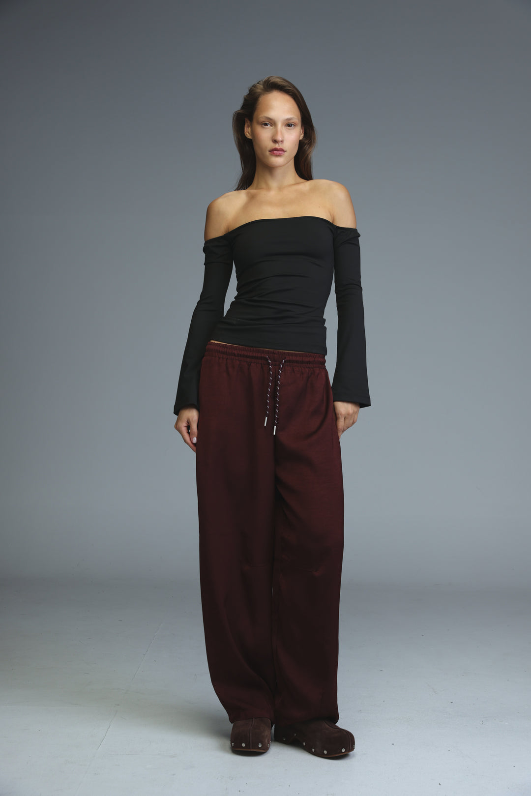 Golden wine bottoms wide-leg trousers in maroon with elastic waistband and drawstring detailing front view