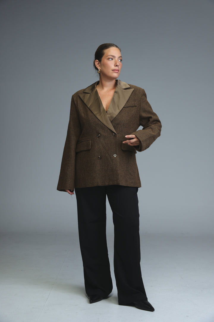 Penthouse brown double-breasted blazer with classic lapel and contrasting lighter-toned inner lining, front view